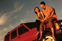 Couple on a Jeep - Keep your car running smoothly with expert auto maintenance and repair services from the ASE-certified technicians at our shop in Jacksonville, Florida. 